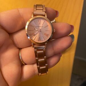 Rose gold watch.
